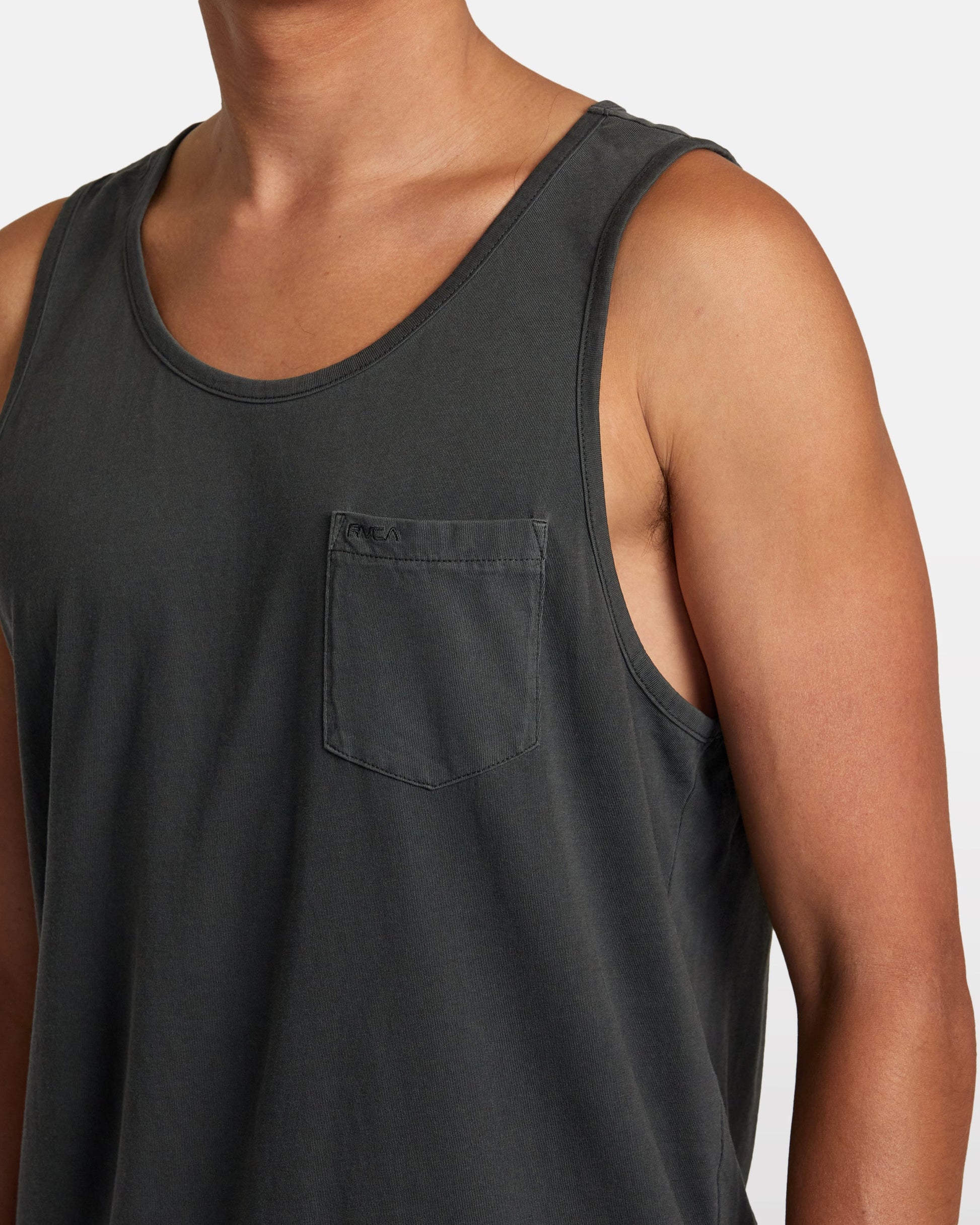 RVCA PTC 2 Pigment Tank in dark charcoal with chest pocket on model