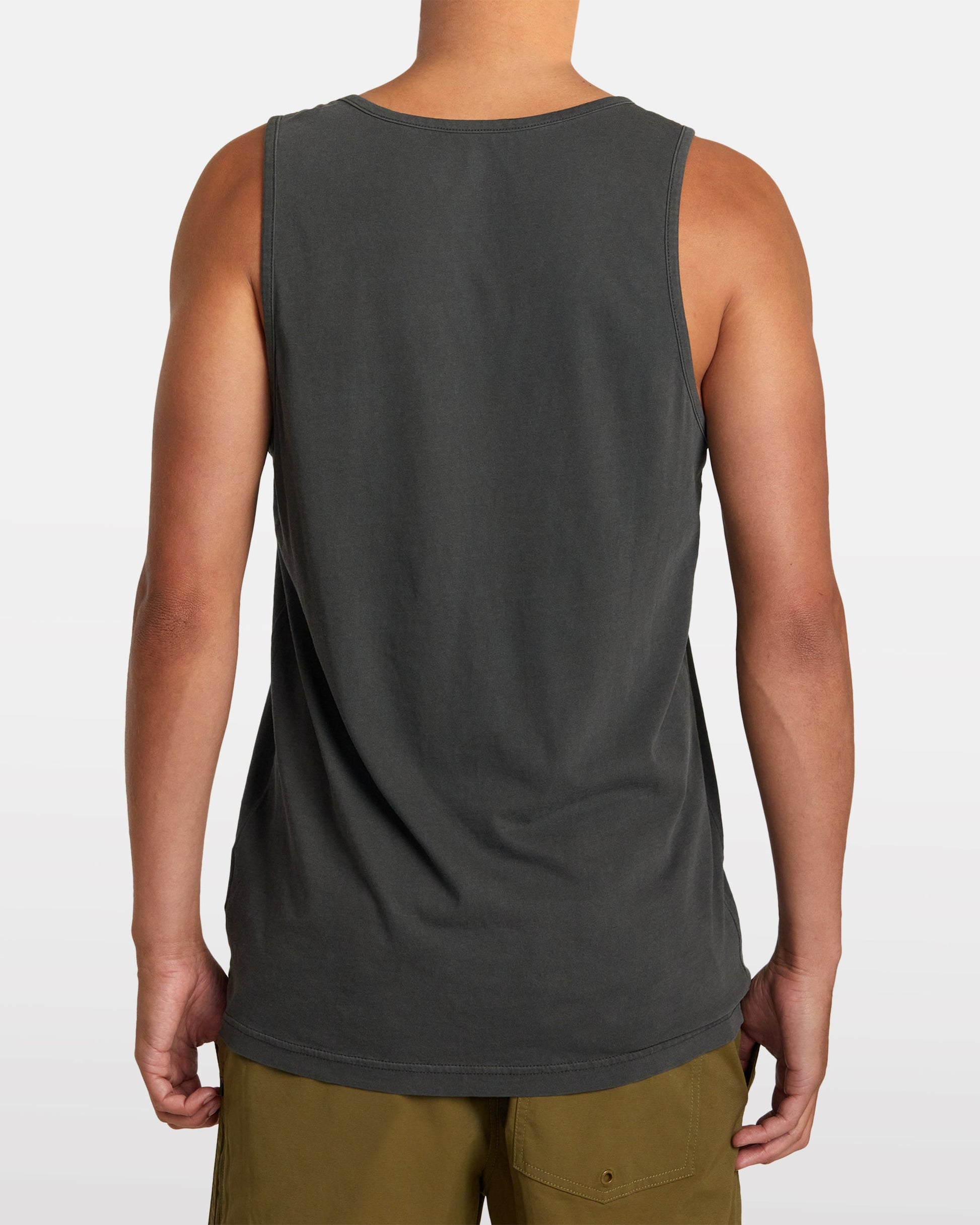 Back view of man wearing RVCA PTC 2 Pigment Tank in dark charcoal color