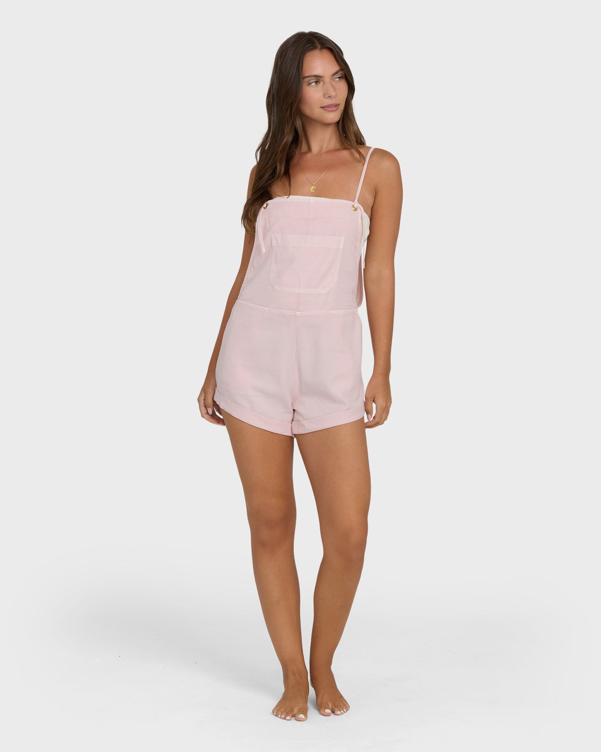 Billabong Wild Pursuit Overall Solid in Rosewater pink worn by brunette model barefoot