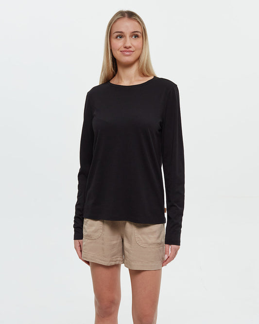 Woman wearing black long-sleeve Tentree Ashwood shirt with beige shorts