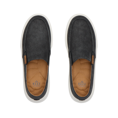 Reef Swellsole Pacific black canvas slip-on shoes with tan insoles on white background