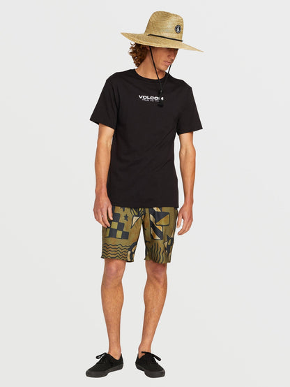 Man wearing Volcom Quarter Straw Hat in natural color with black t-shirt