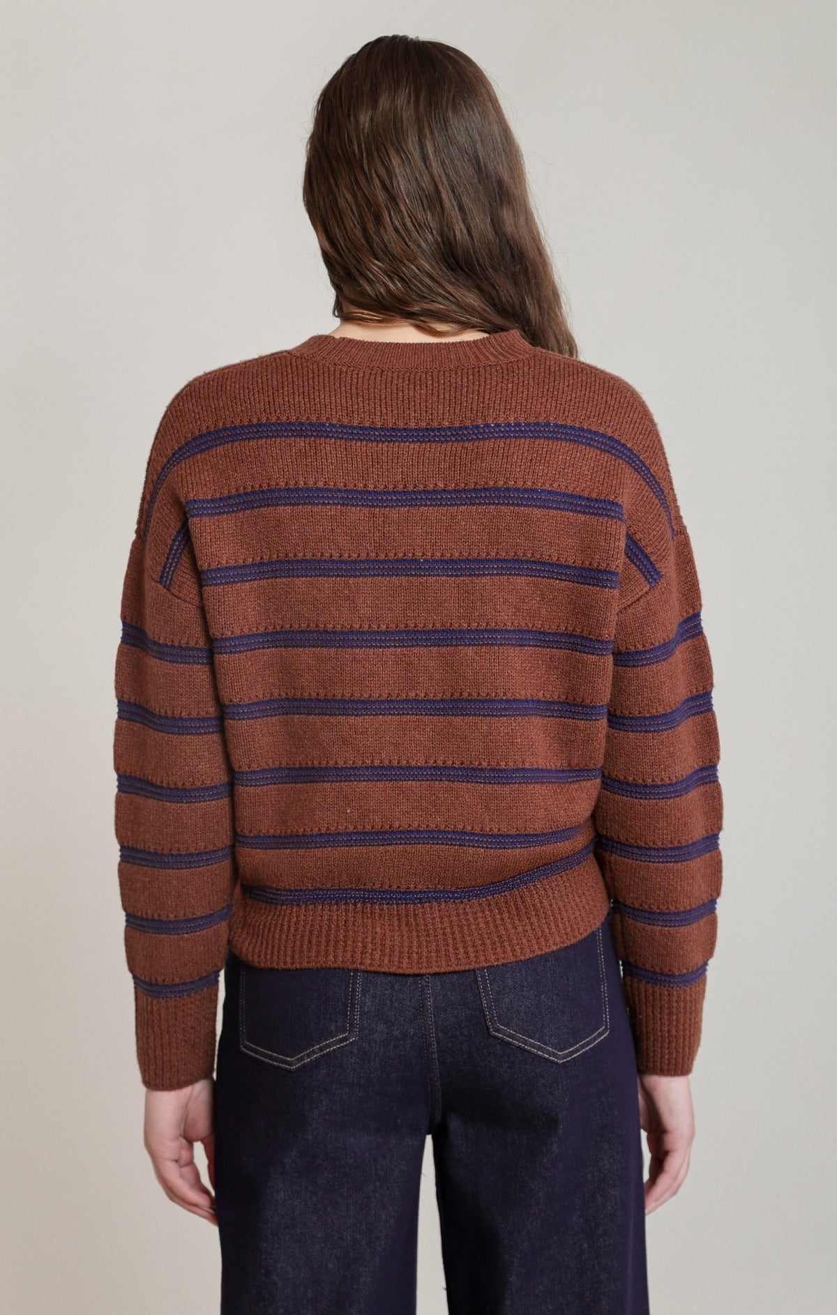 Back view of Dex stripe crewneck sweater in rusty brown with navy blue stripes