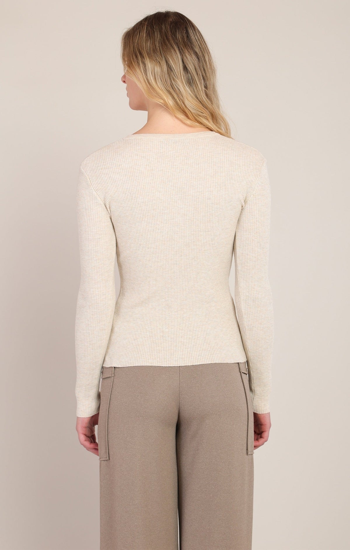 Dex ribbed long-sleeve sweater top in cream heather, back view on model
