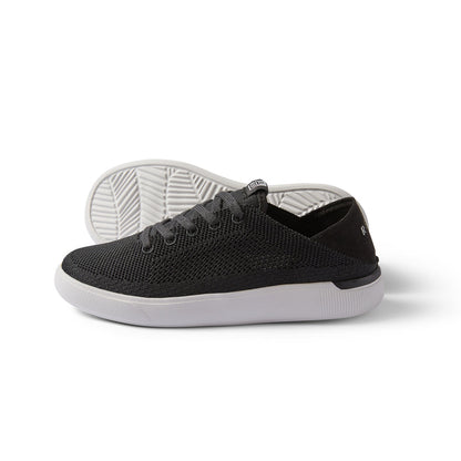 Black Reef Kids Neptune sneakers with white sole on clean background