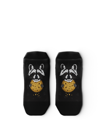 Outway Rad Raccoon black ankle socks featuring raccoon holding a chocolate chip cookie graphic