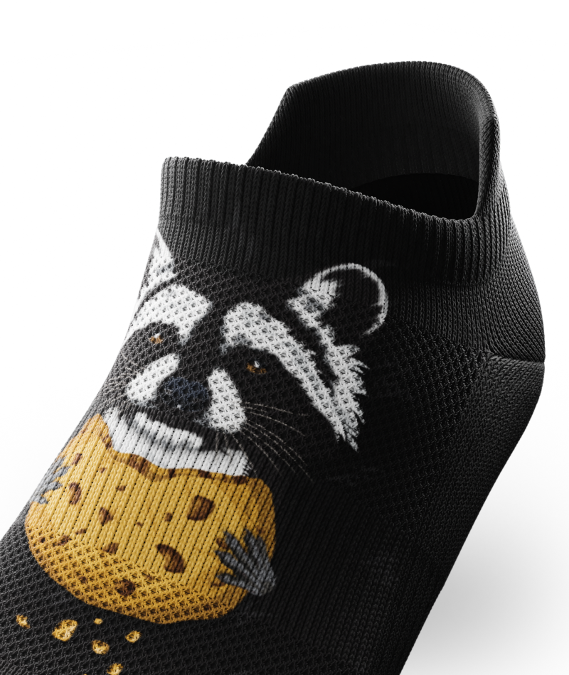 Outway Rad Raccoon black ankle sock featuring a raccoon holding a chocolate chip cookie graphic