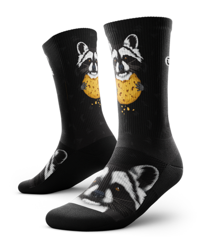 Outway Rad Raccoon Crew Socks in black featuring cartoon raccoon holding a cookie graphic
