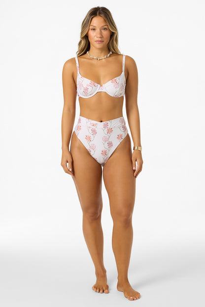 O'Neill Ivy Floral Seashell Bra in white tofu with pink floral print on model