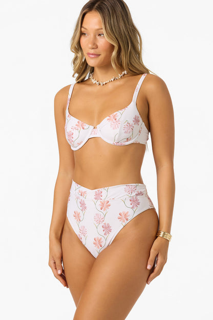 O'Neill Ivy Floral Seashell Bra in tofu white with pink floral print on model