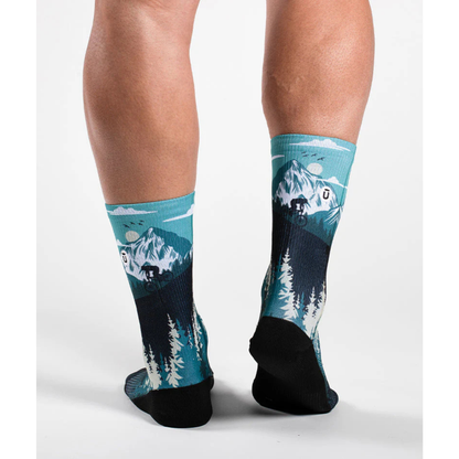 Outway Free Ride Crew Socks featuring mountain biking scene with teal and navy colors