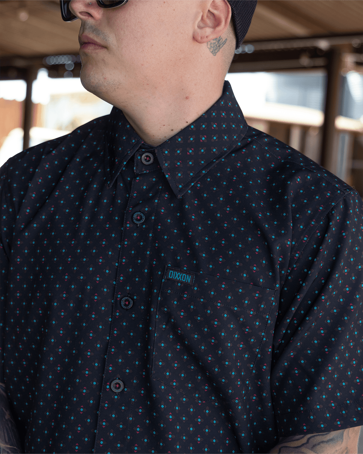 Dixxon High Desert Party Shirt short sleeve black button-up with teal and red pattern