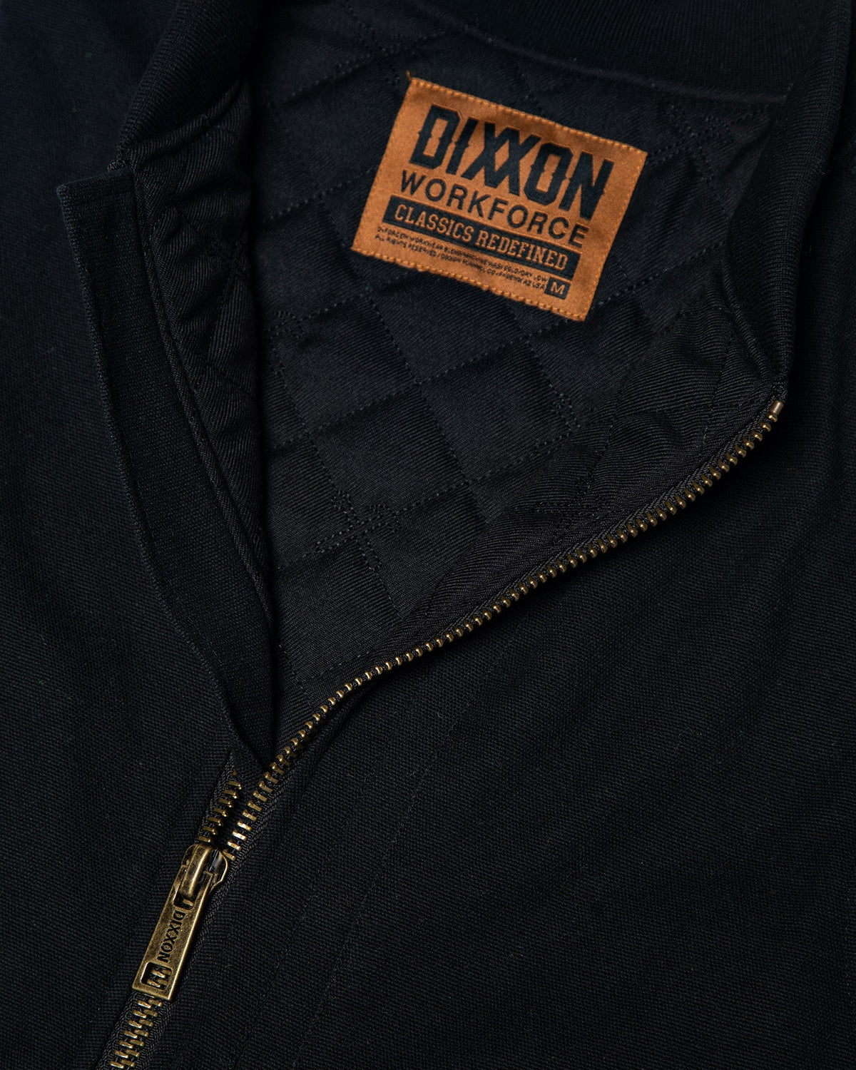 Dixxon Workforce Outlaw Work Vest in black with brass zipper and quilted lining detail