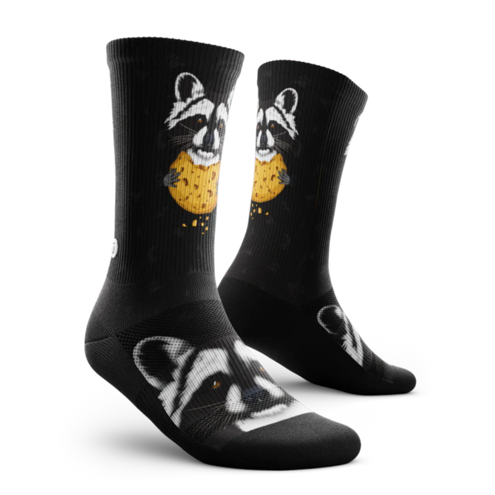 Outway Rad Raccoon Crew Socks in black with raccoon eating a cookie graphic